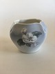 Royal 
Copenhagen Vase 
No 53/423 with 
Flower Motif. 
10 cm H (3 
15/16"). 2nd 
Quality. The 
Vase has ...