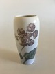 Royal 
Copenhagen Vase 
No 727/235 with 
Flower Motif. 
17 cm H (6 
11/16"). 1st 
Quality in nice 
and ...