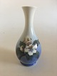 Royal 
Copenhagen Vase 
No. 53/51 with 
Flower Motif. 
22 cm H (8 
21/32"). 1st 
Quality in nice 
and ...