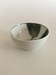 Royal 
Copenhagen Bowl 
with Green Leaf 
Motif by Andy 
CT ? From 1982. 
5.5 cm H (2 
11/64"). 12 cm 
...