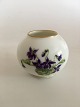 Royal 
Copenhagen Vase 
with Purple 
Flower Motif. 6 
cm H (2 
23/64"). 1st 
Quality. In 
good condition
