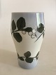 Royal 
Copenhagen Vase 
No 204/65A with 
White 
Symphoricarpos. 
21 cm H (8 
17/64").. 1st 
Quality but ...