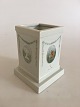 Royal 
Copenhagen 
Overglaze Vase 
with Motifs of 
Fauns and Elf 
Girls. 14 cm H 
(5 33/64"). 
10.5 x ...