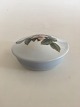 Royal 
Copenhagen 
Lidded Bowl No 
173/2 with 
Flower Motif. 
9.5 cm dia (3 
47/64"). 1st 
Quality. In ...