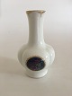 Royal 
Copenhagen Vase 
No 1981/1557 
with Gold and 
Flower Motif. 
16 cm H (6 
19/64"). 2nd 
Quality. ...