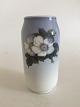 Royal 
Copenhagen Vase 
No 693/2304 
with a motif of 
two white roses 
and a bee. 23 
cm H (9 1/16"). 
...