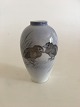 Royal 
Copenhagen Vase 
with Bird Motif 
No 1935/47B. 14 
cm H (5 
33/64"). 2nd 
Quality. In 
nice ...