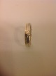 Ring mit 24 
Diamanten.
18 Karat Gold 
750
Diamanten 24 
Einheiten a = 
0,24 0,01 ct 
...