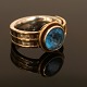 Ring with topaz. 14ct Gold and Silber. Ringsize: 57