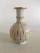 Royal 
Copenhagen 
Blanc de Chine 
vase with guld 
by Arno 
Malinowski No 
3309.
Measures 20cm 
/ 7 ...