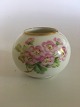 Royal 
Copenhagen 
Miniature Vase 
with Roses in 
Over Glaze. 6 
cm H. In nice 
condition