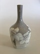 Royal 
Copenhagen Art 
Nouveau Vessel 
Vase No. 
200/135 with 
Daffodil 
decoration. 16 
cm H. 1st ...