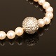 Ole Lynggaard: Pearl necklace with 14kt gold snap. D: 1,4cm