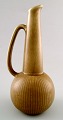 Large Rörstrand 
"Ritzi" ceramic 
vase / pitcher.
Sweden, 1960s.
Beautiful 
glaze in 
nuances of ...