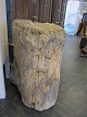 Chopping block
An old chopping block with a iron-piece on which 
you hammered the scythe keen
H: 63cm, Diam: 43cm
