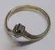 Goldring 8 
Karat Gelbgold 
mit Diamanten. 
20. Jahrhundert 
Diamond:. 0,01 
Karat. 
Gestempelt. ...