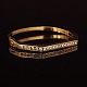 Bangle, 18ct gold, with 24 diamonds. Size: 4,6x5,5cm