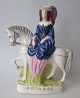 Staffordshire 
Figur 
"Duchess", 
bemalte 
Fayence, ca. 
1840, England. 
22,5 x 16,5 cm.
Schöner arbeit