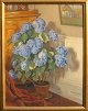 Lønborg, Harald 
(1868 - 1942) 
Dänemark. Eine 
blühende 
Topfpflanze in 
einem sonnigen 
Raum. Öl auf 
...