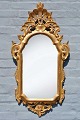 Italienischer 
Spiegel aus 
vergoldetem 
Rokoko, 20. Jh. 
91 x 45 cm.
Provenienz: 
Künstlerpaar 
...