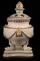 Rare potpourri 
jar with 
overglaze from 
Royal 
Copenhagen with 
faces and fish 
feet.
Factory 1st 
...