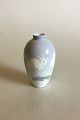 Royal 
Copenhagen Art 
Nouveau Vase 
decrated with 
Rabbits No 
243/47A. 
Measures 11 cm 
/ 4 21/64 in.