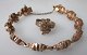 Finnischer Schmuck aus Bronze, 20. Jh. Bestehend aus Armband und Ring. Länge Armband: 18 cm. ...