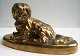 Bronzefigur des liegenden Hundes auf ovalem Fuß, 19. Jh. L .: 16 cm. D: 6,5 cm. H: 8,5 cm. ...