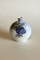 Royal 
Copenhagen Vase 
with Blue 
Flower No 
1763/209B. 
Measures 14.8 
cm / 5 53/64 
in. From 
1899-1922