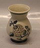 1 pcs. In stock
28-1 RC Vase 
12.5 cm (1927) 
With flowers 
and berries 
Royal 
Copenhagen 
Aluminia ...