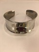 Armband mit 
Amatyst.
Tin von Jørgen 
Jensen.
Breite der 
Oberseite: 3,2 
cm.
Schön und 
frisch ...