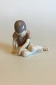 Bing & Grondahl 
Figurine of Boy 
sitting looking 
down No 1671. 
Measures 9.7 cm 
/ 3 13/16 in.