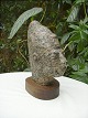 Kopf in Stein 
gehauen
H: 25 cm