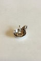 Georg Jensen 
Silver 
Ornamaental 
Salt Spoon and 
Salt Bowl. 
Measures 5 cm / 
1 31/32 in.
