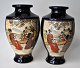 Paar japanische 
signierte 
Satsuma Vasen, 
Fayence, ca. 
1900. Hand 
dekoriert. 
Polycrome 
Dekoration ...