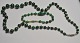 Malekit-Schmuckset bestehend aus Kette und Armband, 20. Jh. Kettenlänge: 62 cm. Armbandlänge: 22 cm.