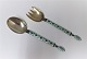 Norway. 
Tostrup. 
Sterling (925). 
Serving set 
with green 
enamel. Length 
17.5 cm.