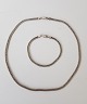 Flat necklace & 
bracelet in 
sterling silver 

Stamped: 925 
Necklace: 
Length 42.5 cm. 
Width 4 ...