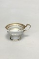 Sevres France, 
Gilt and 
Grisaille over 
glaze hand 
painted  
Mourning Cup. 
Chevron shaped 
ending ...