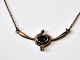Schmuck in 
Silber, 
bestehend aus 
Halskette und 
...