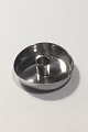 Georg Jensen 
Sterling Sølv 
lysestage af 
Arno Malinowski 
no 1061.
Måler 5,9cm 
dia 
Vejer 40 ...