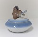 Bing & 
Grøndahl. 
Porcelæns 
bonnonniere. 
Model 1623. 
Højde 10,5 cm. 
(1 sortering)