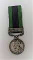 Indien-Medaille 1908-1935, Waziristan 1919-21. Am Rand eingraviert 28 SOWAR KHAZAN SINGH - 21 CAVY.