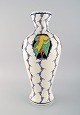 Boch Freres 
Keramis, 
Belgium. Large 
art deco vase 
in glazed 
ceramics with 
hand-painted 
birds. ...