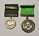 Ein Paar Medaillen von Skytteforeningen, Centrum, Aarhus in Sterlingsilber, Dänemark des 20. ...