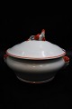 Old Swedish 
Gustavsberg 
Christmas 
terrine in 
faience, 
decorated with 
a lying Santa 
on the lid, ...