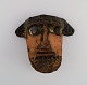 Niels Helledie 
(b. 1927), 
Denmark. Unique 
face mask in 
hand-painted 
glazed 
stoneware. ...