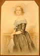 Unknown artist 
(19th century): 
Portrait of a 
woman. 
Watercolor. 
Signed November 
1843. 25.5 x 
...