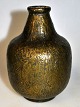 Vase aus 
Bronzeguss, ca. 
1900 - 1920. 
Mit Gussmuster. 
Ungestempelt. 
H.: 12,5 cm.