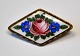 Antike 
Emaille-Brosche 
mit Blumen, 
Italien des 19. 
Jahrhunderts. 
3x 1,8cm.
Perfekter 
Zustand!